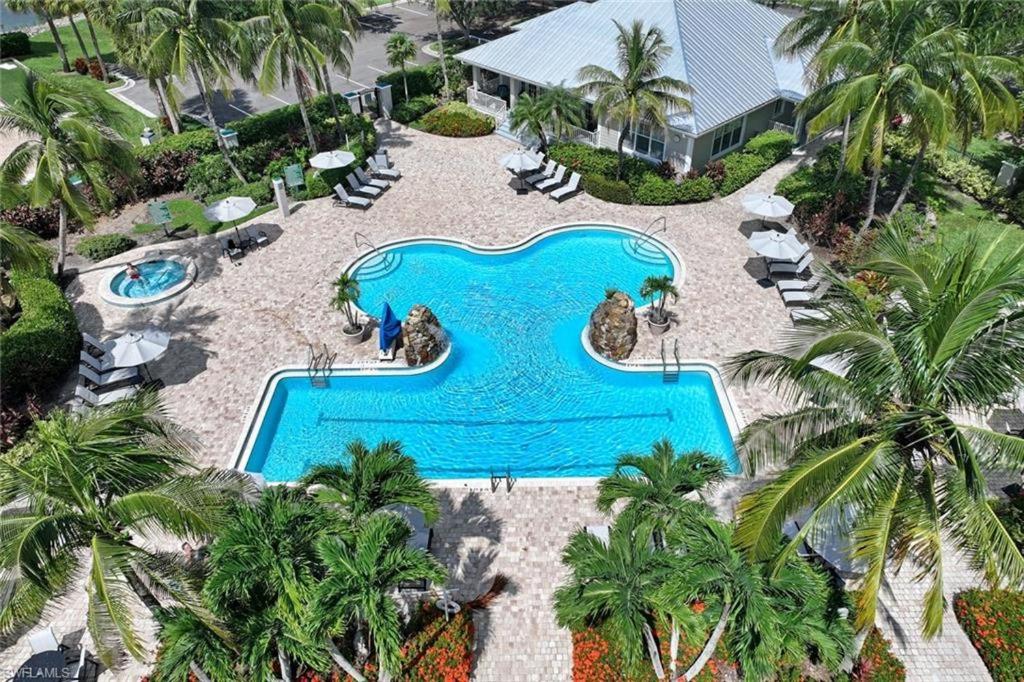 an overhead view of a swimming pool at a resort at Spacious 2BR Lely Resort Condo with Lake View steps to Pool Hot Tub Gym in Naples