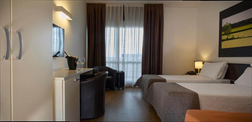 Postel nebo postele na pokoji v ubytování Hotel Eurorest