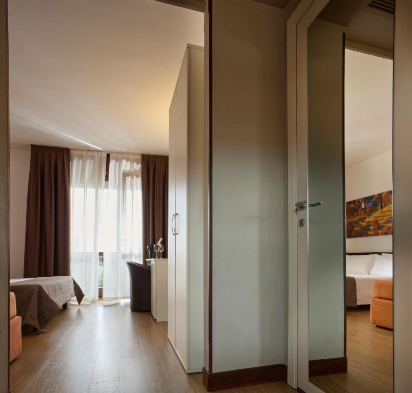 Postel nebo postele na pokoji v ubytování Hotel Eurorest