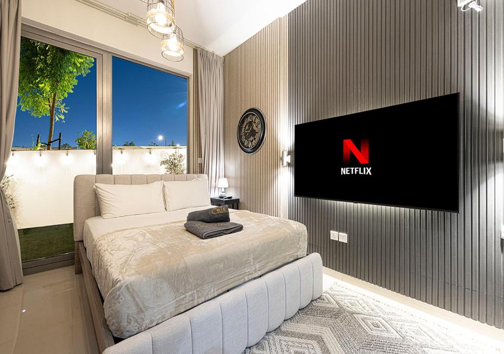 Postel nebo postele na pokoji v ubytování Apartment With Private Garden at Al Zahia - Garden Haven