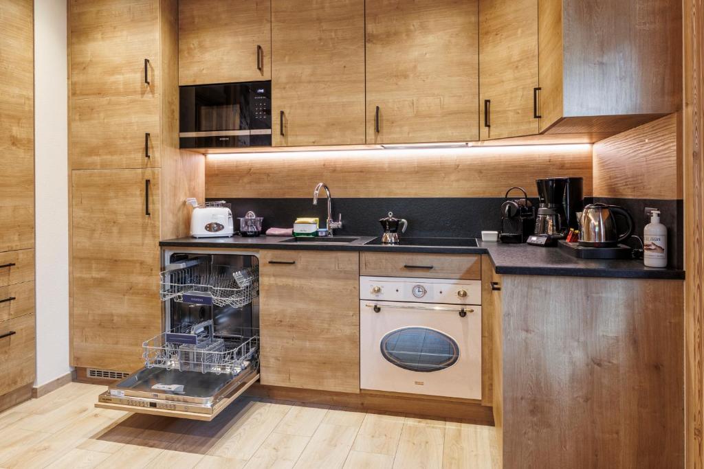 Kuchnia lub aneks kuchenny w obiekcie AG Apartments Livigno centro