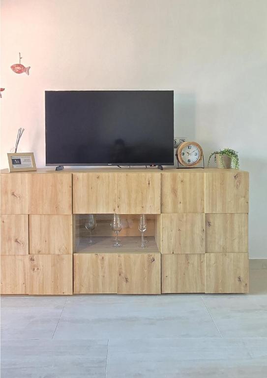 TV a/nebo společenská místnost v ubytování Ocean Bliss
