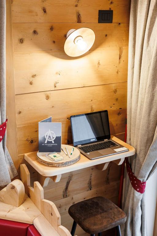Telewizja i/lub zestaw kina domowego w obiekcie AG Apartments Livigno centro