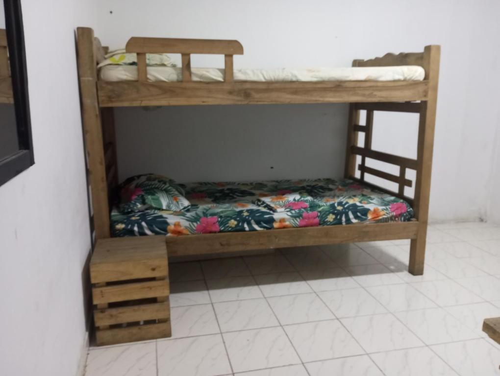 Postel nebo postele na pokoji v ubytování Nahimara Champeta Hostel
