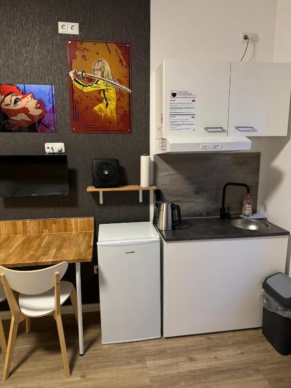 Kuchyň nebo kuchyňský kout v ubytování Room Pauli