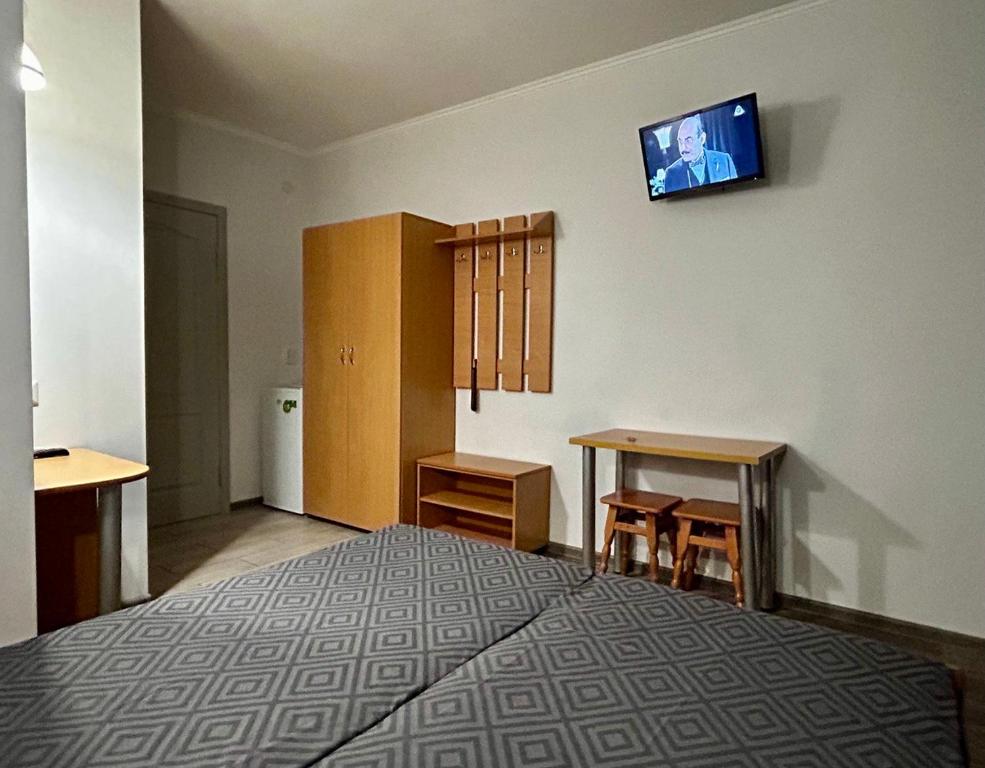 Postel nebo postele na pokoji v ubytování Ассоль