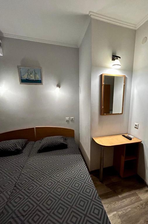Postel nebo postele na pokoji v ubytování Ассоль
