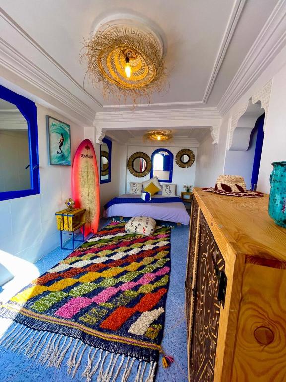 Postel nebo postele na pokoji v ubytování Surf & Salsa Ocean House