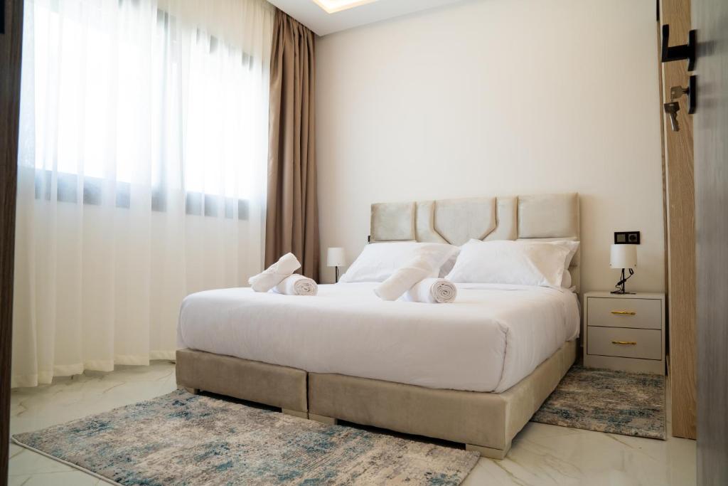 Postel nebo postele na pokoji v ubytování Living Appart-Hotel