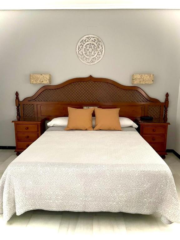 Postel nebo postele na pokoji v ubytování Hotel Los Omeyas