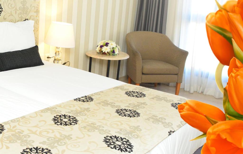 Postel nebo postele na pokoji v ubytování Eldan Hotel