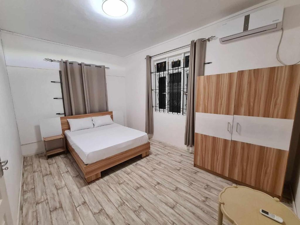 Postel nebo postele na pokoji v ubytování Elysiane