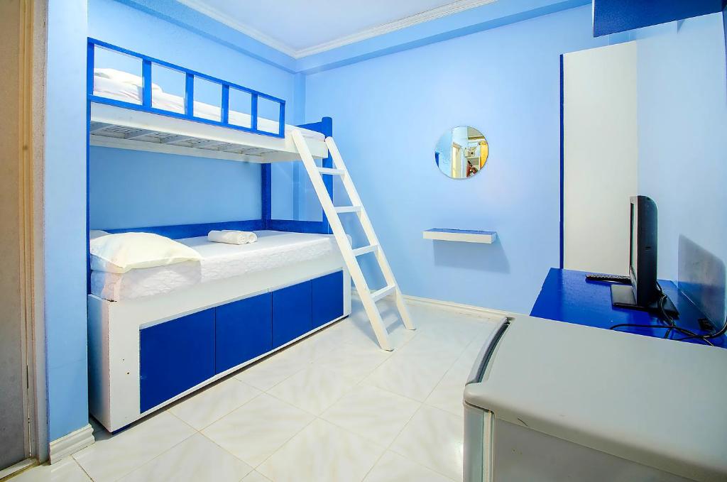 Letto o letti in una camera di Bambooze Hauz