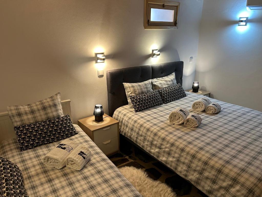 Uma cama ou camas num quarto em Casa do Gato