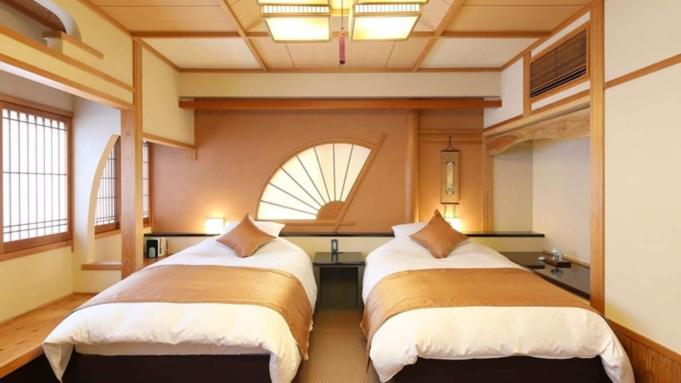 Postel nebo postele na pokoji v ubytování Ryokan Shinsen