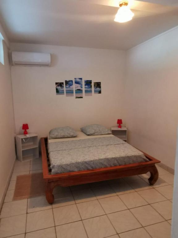 Postel nebo postele na pokoji v ubytování Anais Loc