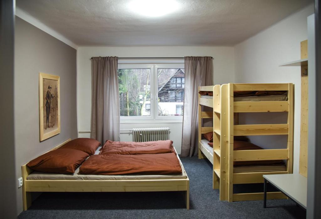 Postel nebo postele na pokoji v ubytování Penzion Kouty