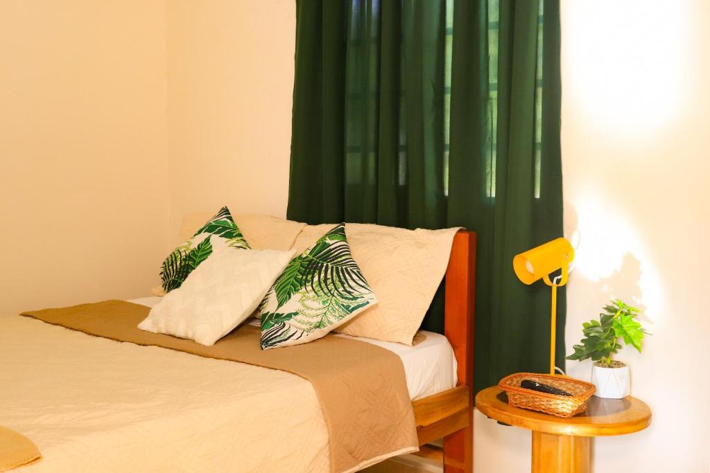 Ένα ή περισσότερα κρεβάτια σε δωμάτιο στο El Cabrero by Alohouse -Apartamentos en David