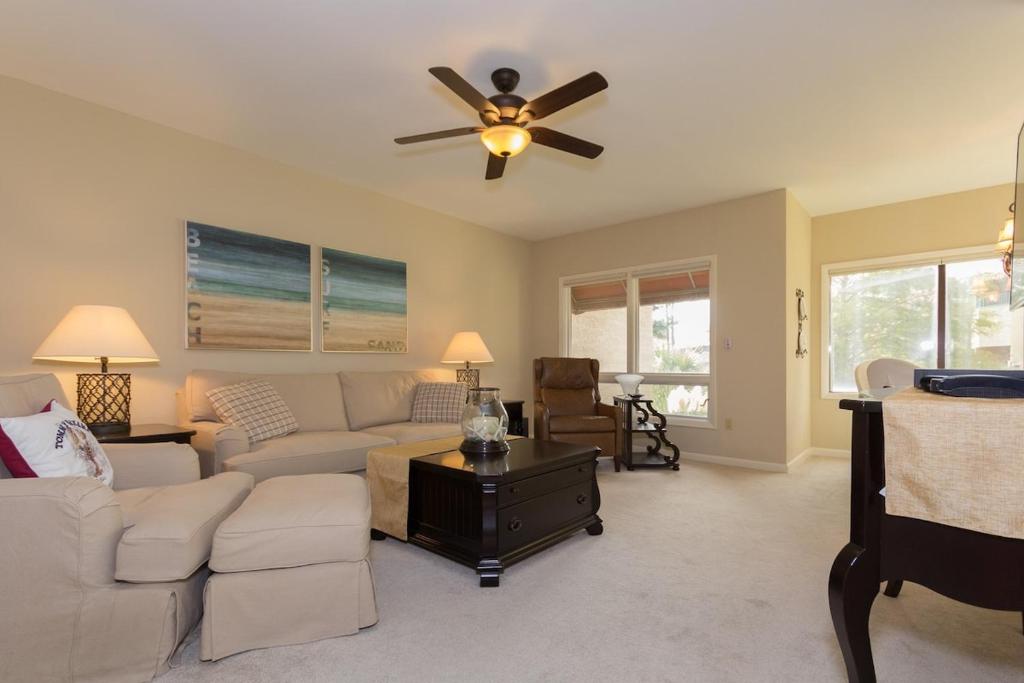 a living room with a couch and a ceiling fan at Beautiful 2 Bed2 Bath Shelter Cove Anchorage Villa in Hilton Head Island