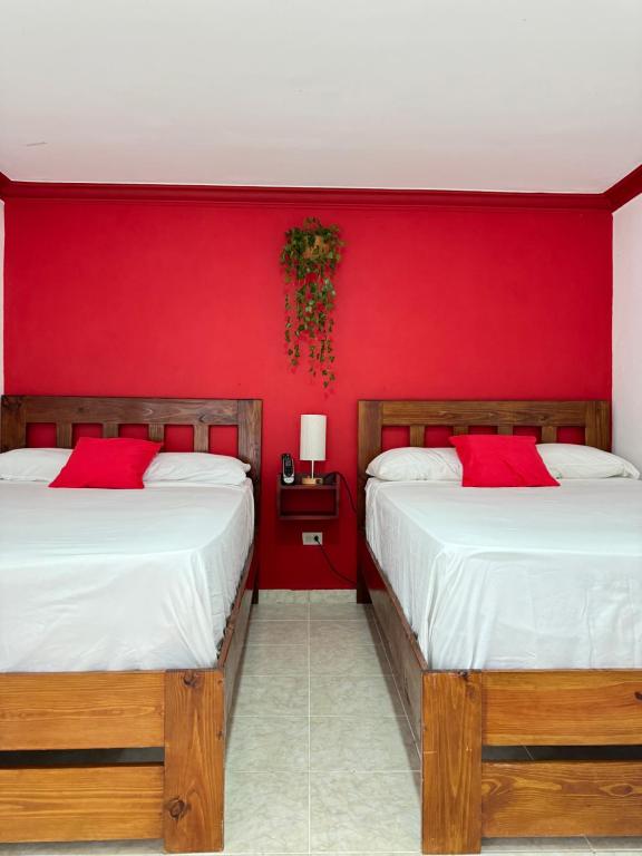 Letto o letti in una camera di LUTIX HOTELS