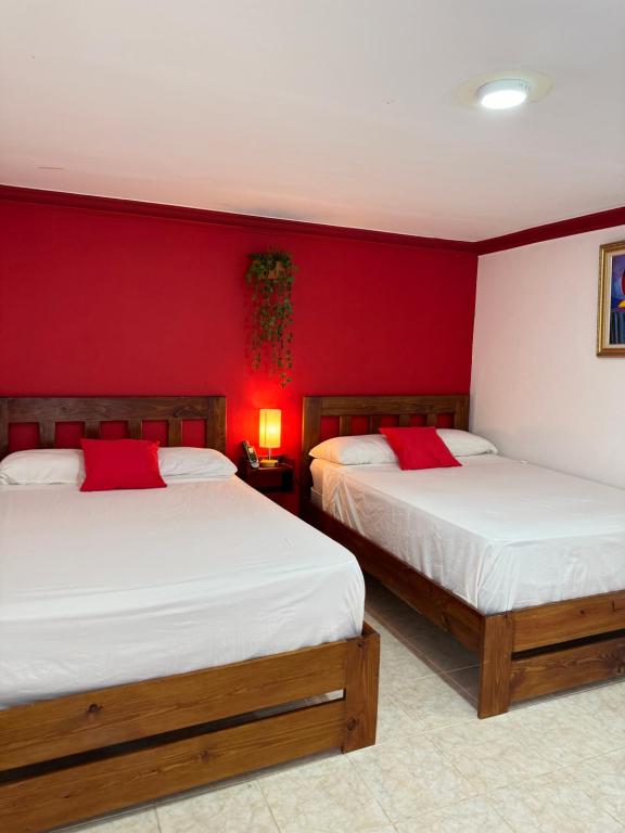 Letto o letti in una camera di LUTIX HOTELS