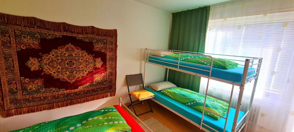 Postel nebo postele na pokoji v ubytování Hotel garni Am Hochwald