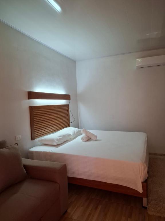 Postel nebo postele na pokoji v ubytování Bungalow Batsù