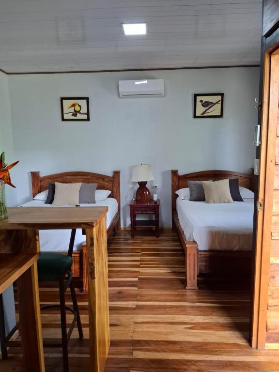 Postel nebo postele na pokoji v ubytování Bungalow Batsù