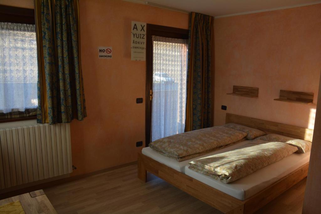Łóżko lub łóżka w pokoju w obiekcie Chalet Rin Star