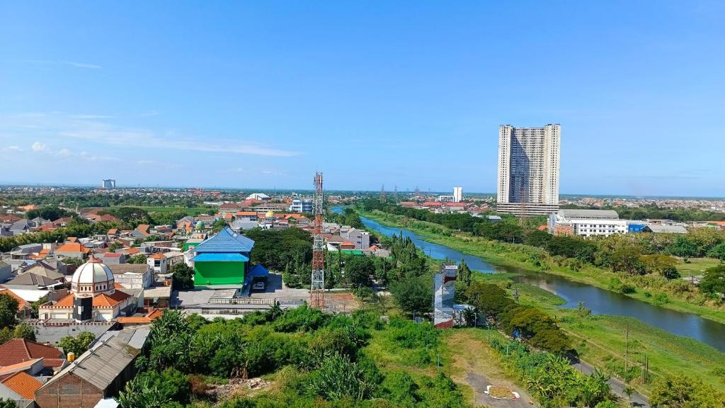 Nespecifikovaný výhled na destinaci Surabaja nebo výhled na město při pohledu z aparthotelu
