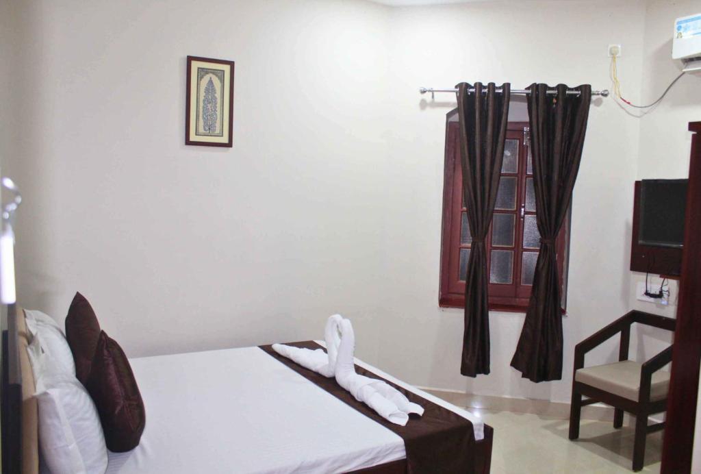 Postel nebo postele na pokoji v ubytování Hotel Yubraj