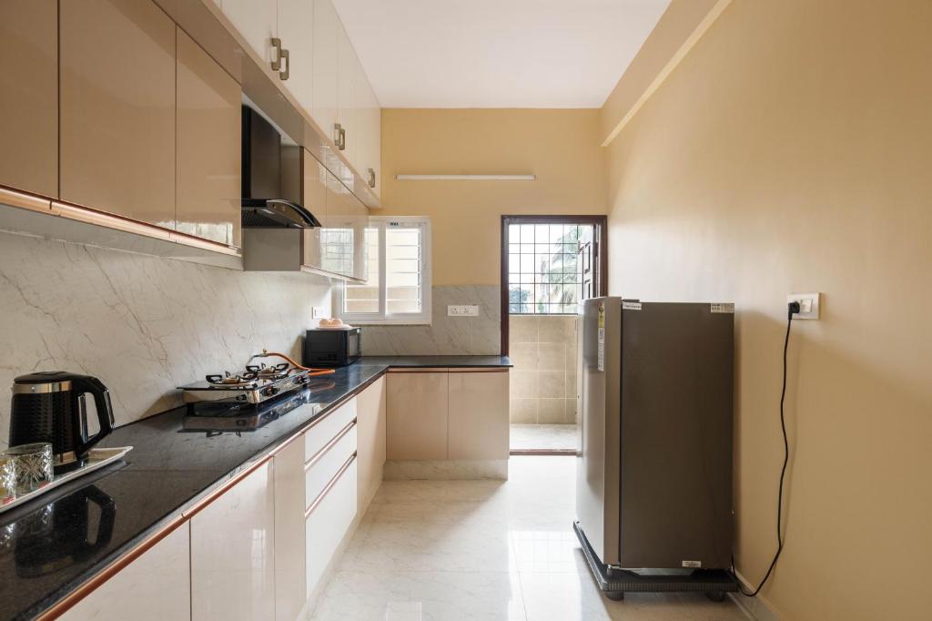 Kuchyň nebo kuchyňský kout v ubytování Pinnacle Serviced Apartments