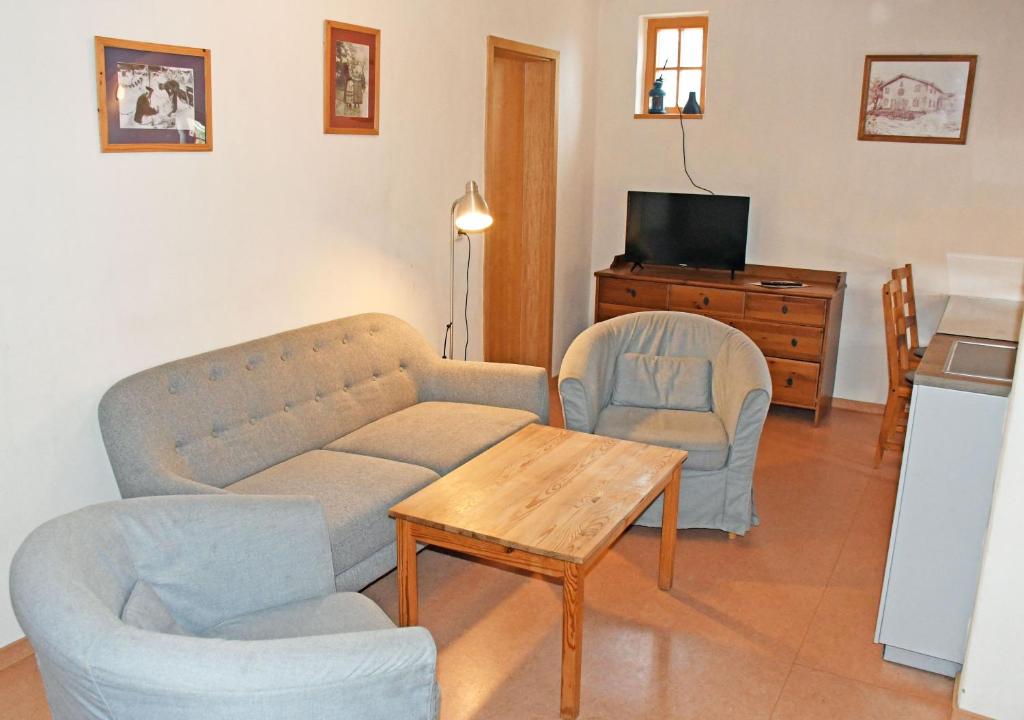 TV a/nebo společenská místnost v ubytování Haus am Hoeft in Gager mit Seeblick