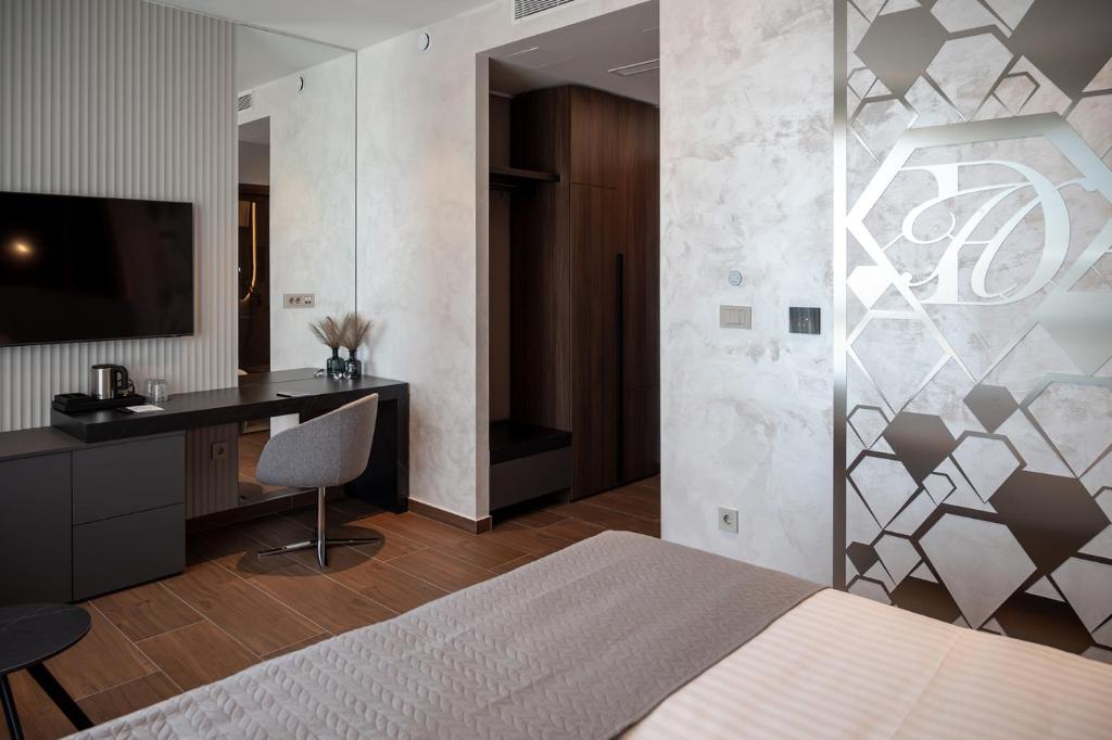 Postel nebo postele na pokoji v ubytování Diamond Hotel