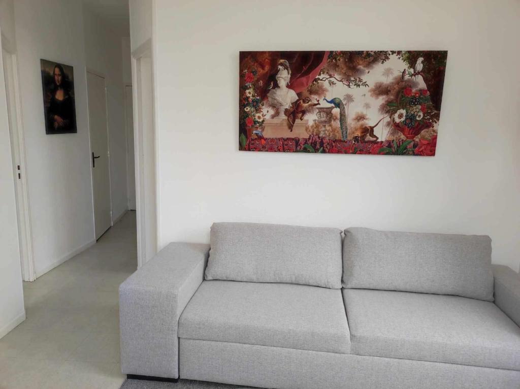 Ruang duduk di Appartement plein de charme - Centre Bar-Sur-Aube