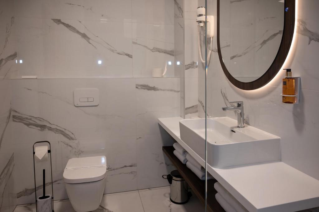 Koupelna v ubytování Diamond Hotel