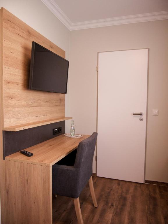 TV a/nebo společenská místnost v ubytování Hotel Paulushof