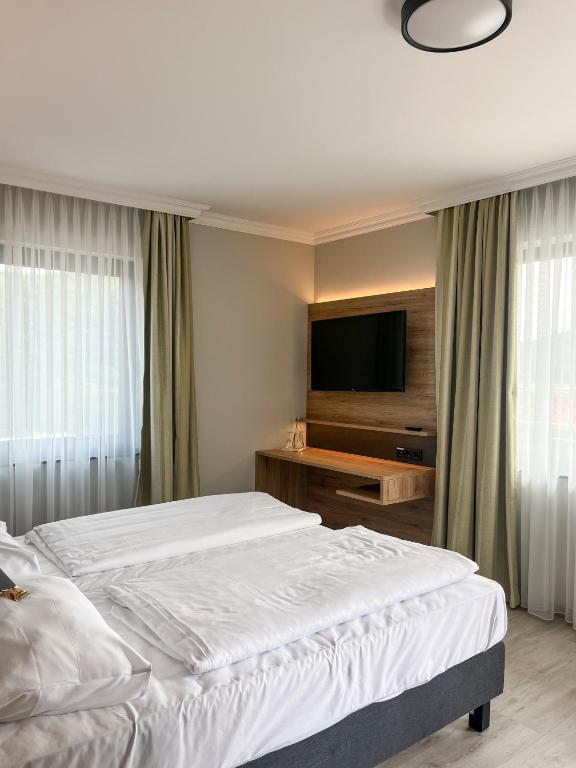 Postel nebo postele na pokoji v ubytování Hotel Paulushof