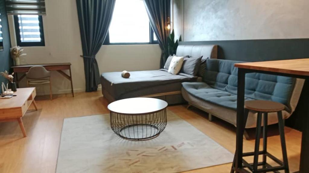 Posezení v ubytování Chambers Residence by Cozy Haven
