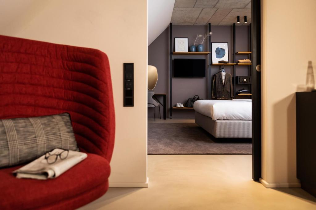 TV a/nebo společenská místnost v ubytování MIANO Hotel & Bar