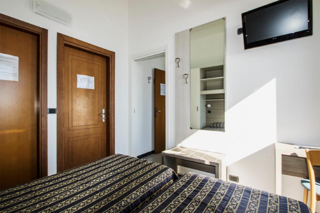 TV a/nebo společenská místnost v ubytování Hotel Baia
