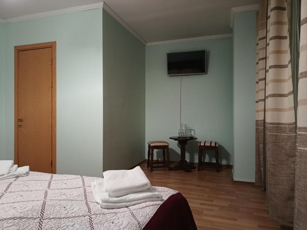 Postel nebo postele na pokoji v ubytování Вілла Токай
