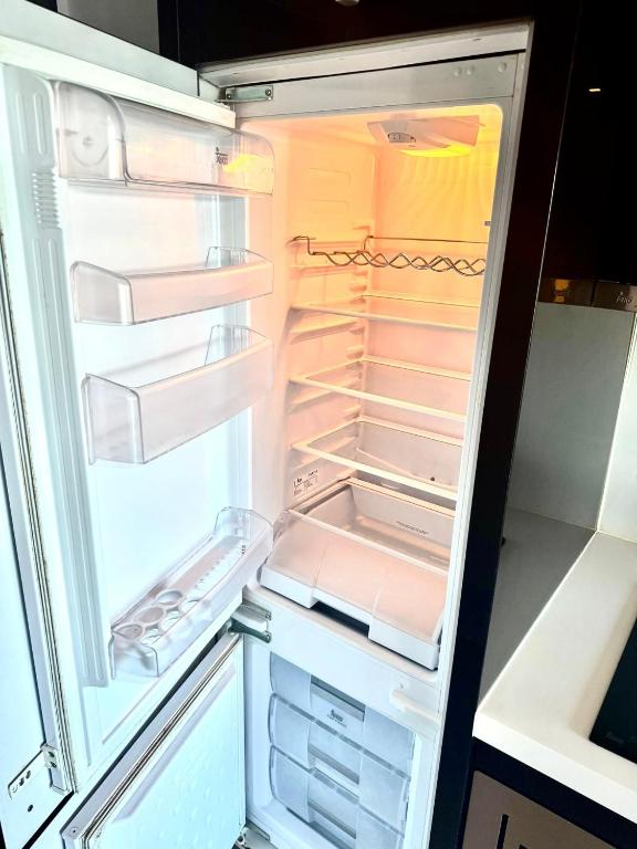 Kuchyň nebo kuchyňský kout v ubytování Centara Pattaya Apartment