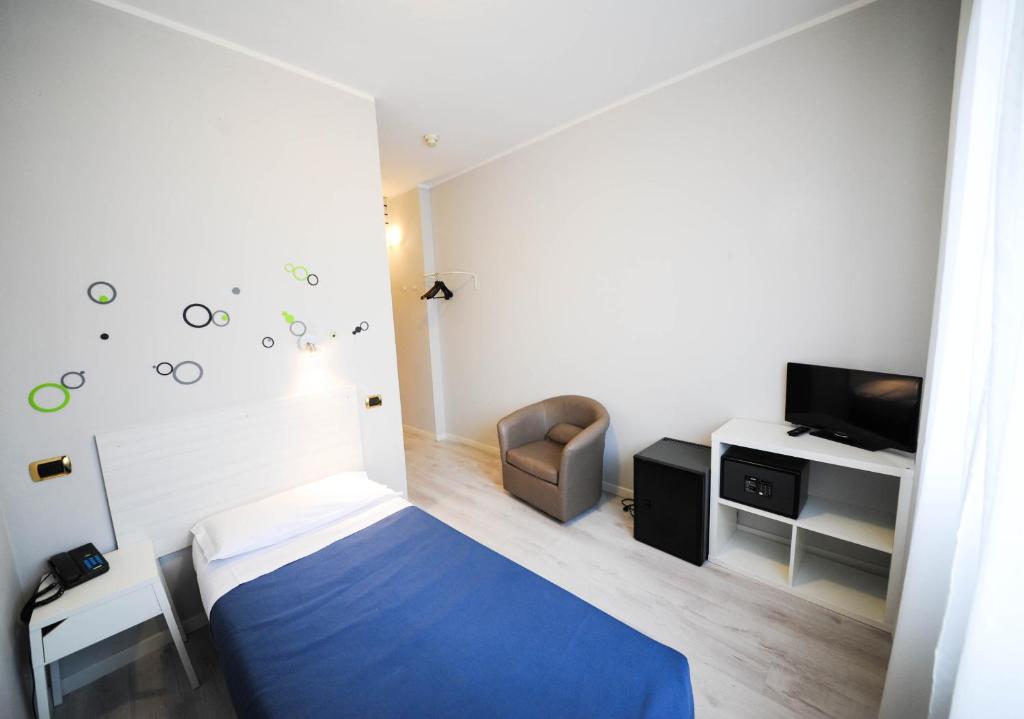 Posteľ alebo postele v izbe v ubytovaní Hp Fly Hotel Bologna