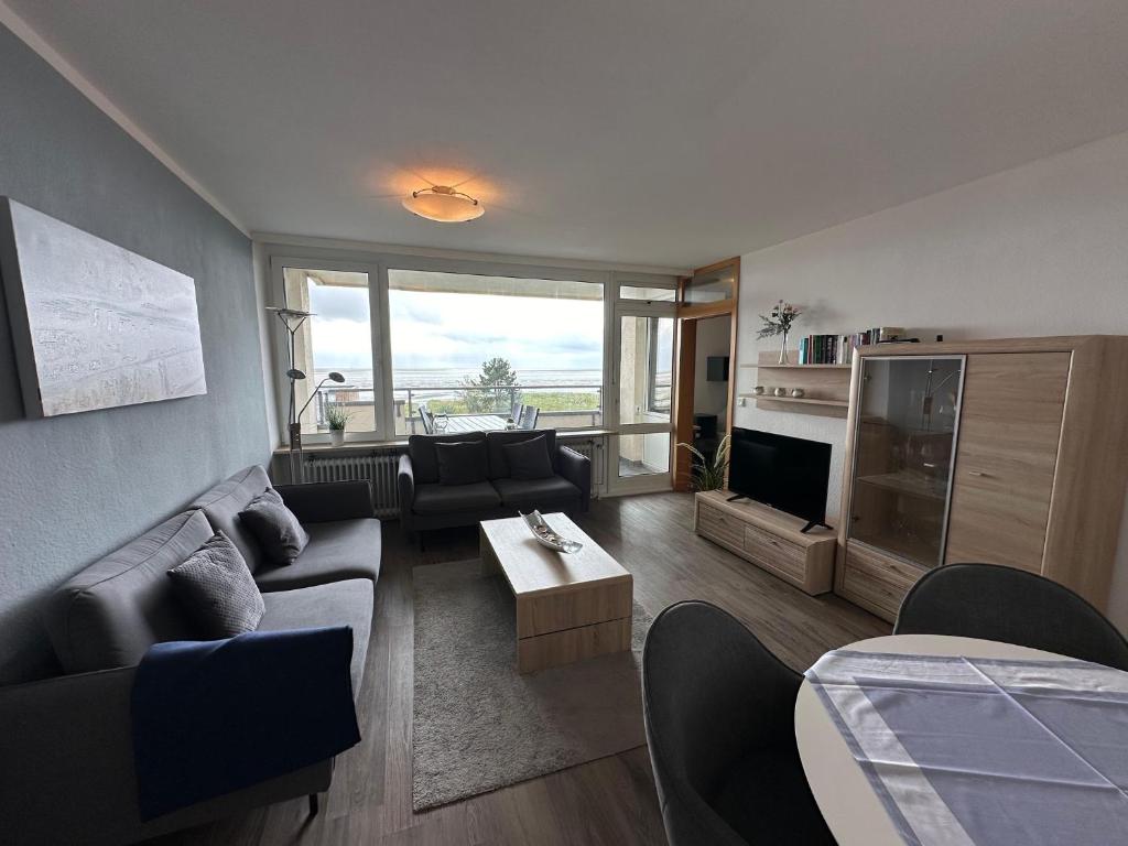 TV/trung tâm giải trí tại Haus Uthlande Ferienwohnung Küstenperle
