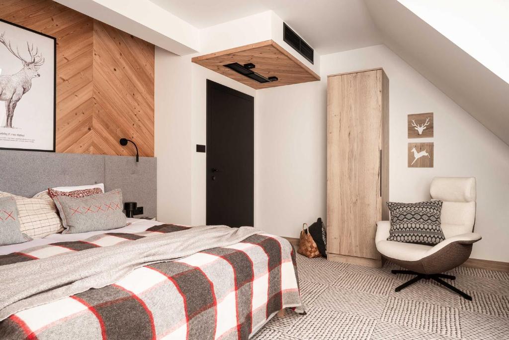 Postel nebo postele na pokoji v ubytování Stefanova Zakopane Aparthotel & Spa