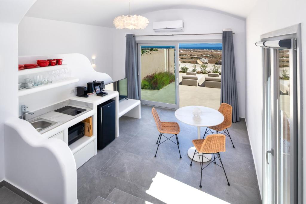 Eldhús eða eldhúskrókur á Felicity Cave Suites
