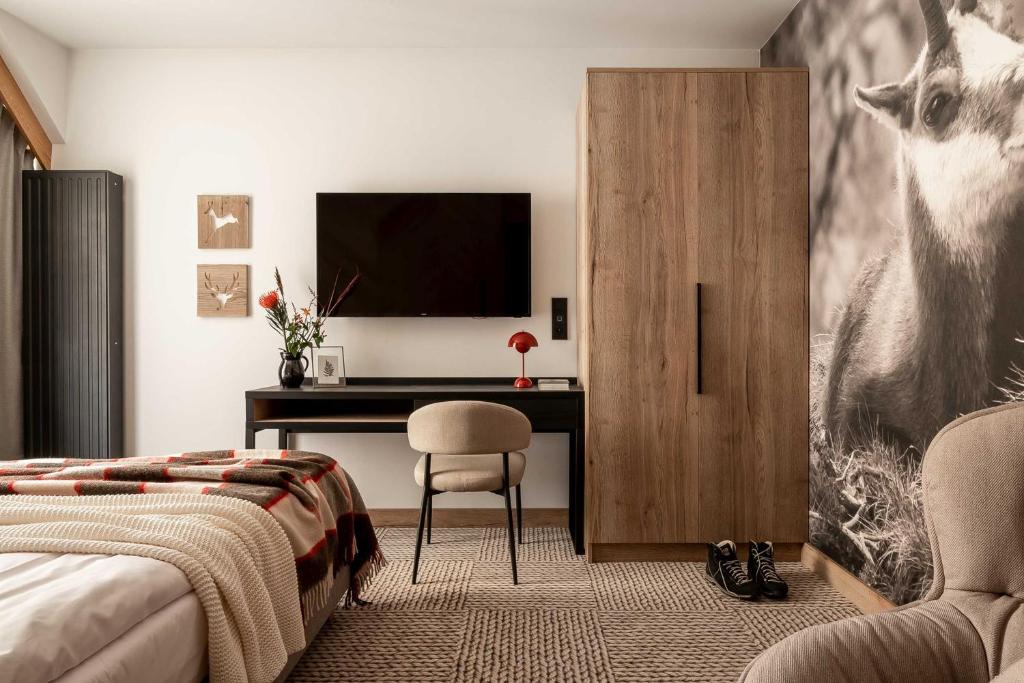 Postel nebo postele na pokoji v ubytování Stefanova Zakopane Aparthotel & Spa
