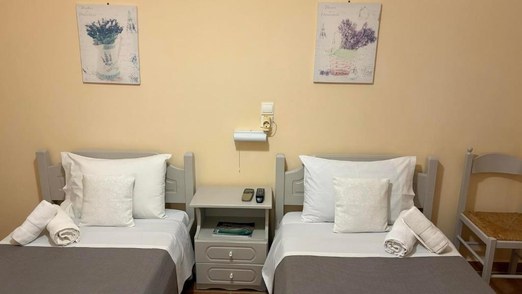 Postel nebo postele na pokoji v ubytování romanza rooms
