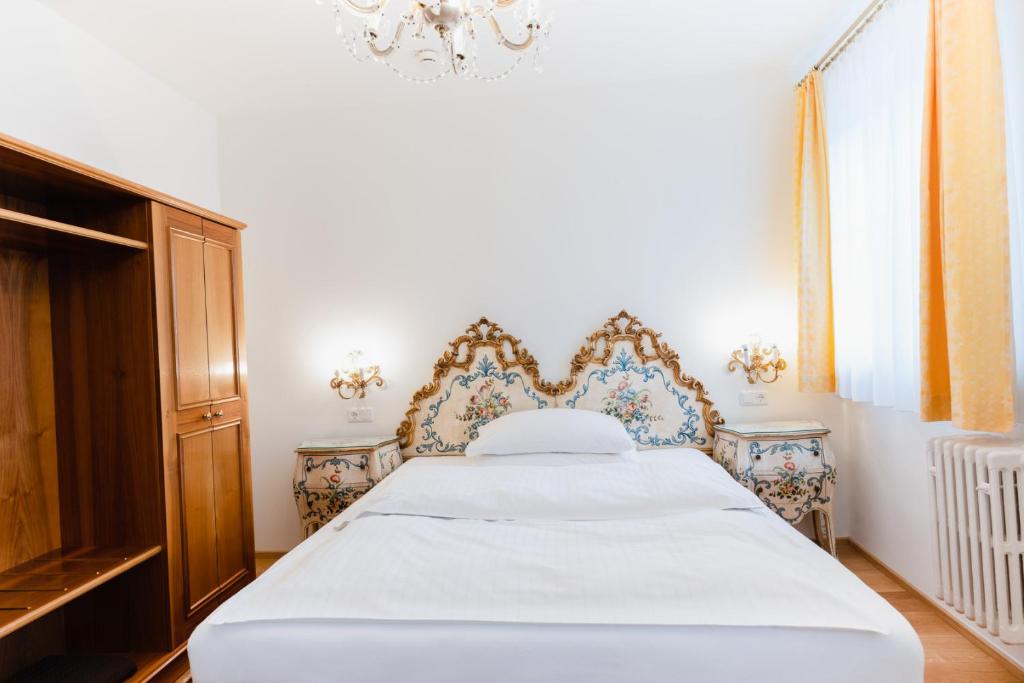 Voodi või voodid majutusasutuse Austria Classic Hotel Wolfinger - Hauptplatz toas